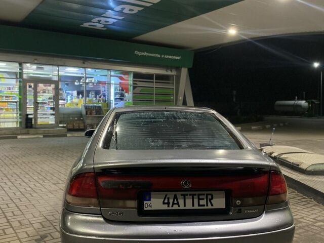 Серый Мазда 626, объемом двигателя 2.5 л и пробегом 480 тыс. км за 1850 $, фото 4 на Automoto.ua