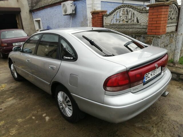 Серый Мазда 626, объемом двигателя 1.8 л и пробегом 1 тыс. км за 1800 $, фото 2 на Automoto.ua