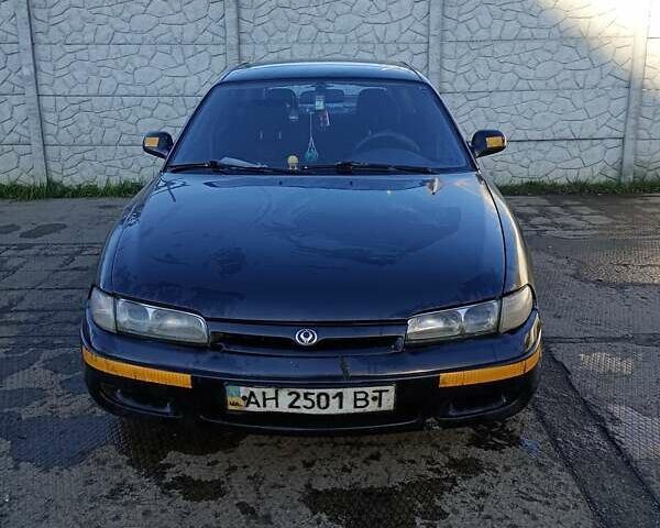 Серый Мазда 626, объемом двигателя 1.8 л и пробегом 444 тыс. км за 1100 $, фото 2 на Automoto.ua