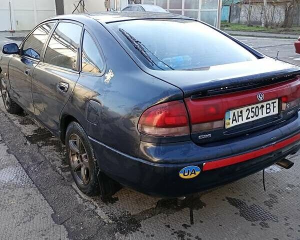 Серый Мазда 626, объемом двигателя 1.8 л и пробегом 444 тыс. км за 1100 $, фото 4 на Automoto.ua