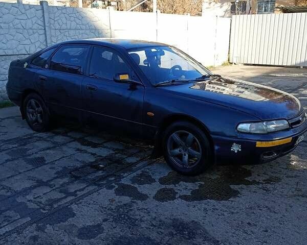 Серый Мазда 626, объемом двигателя 1.8 л и пробегом 444 тыс. км за 1100 $, фото 1 на Automoto.ua