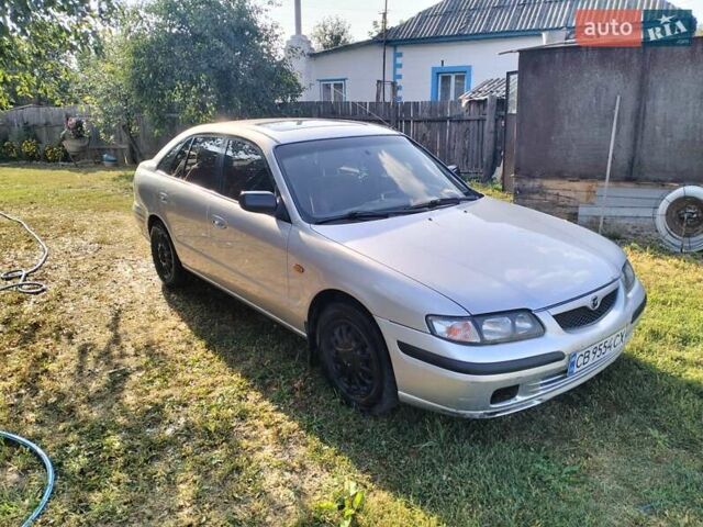 Серый Мазда 626, объемом двигателя 2 л и пробегом 630 тыс. км за 2700 $, фото 2 на Automoto.ua