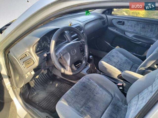 Серый Мазда 626, объемом двигателя 2 л и пробегом 630 тыс. км за 2700 $, фото 6 на Automoto.ua