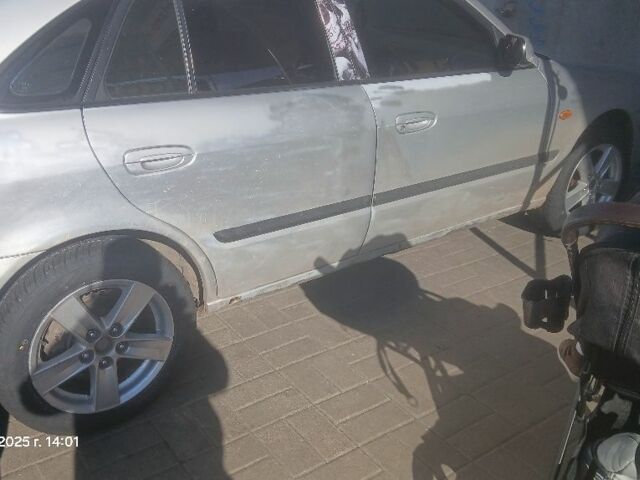 Серый Мазда 626, объемом двигателя 2 л и пробегом 1 тыс. км за 2700 $, фото 1 на Automoto.ua