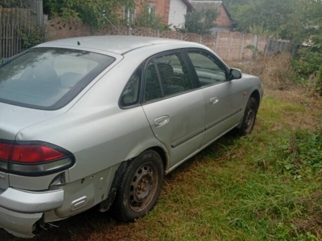 Сірий Мазда 626, об'ємом двигуна 2 л та пробігом 2 тис. км за 2063 $, фото 6 на Automoto.ua