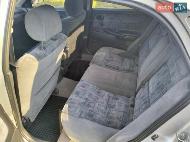 Серый Мазда 626, объемом двигателя 2 л и пробегом 630 тыс. км за 2700 $, фото 4 на Automoto.ua