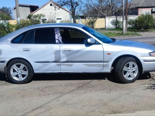 Серый Мазда 626, объемом двигателя 2 л и пробегом 1 тыс. км за 2700 $, фото 4 на Automoto.ua