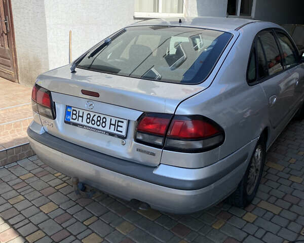 Серый Мазда 626, объемом двигателя 2 л и пробегом 540 тыс. км за 2800 $, фото 4 на Automoto.ua