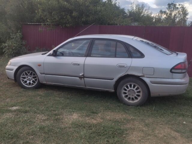 Серый Мазда 626, объемом двигателя 2 л и пробегом 250 тыс. км за 800 $, фото 3 на Automoto.ua