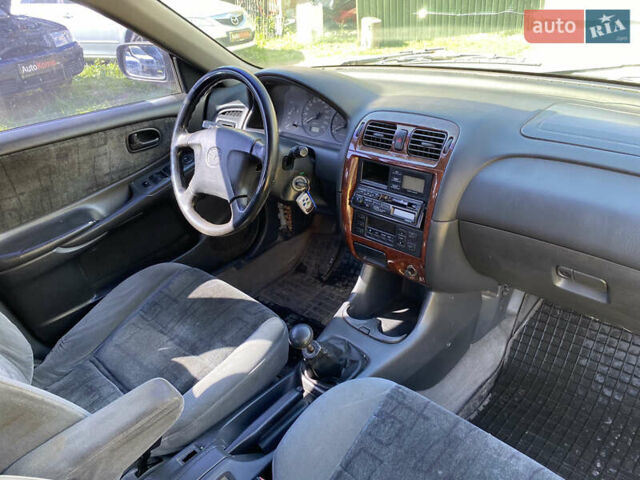 Серый Мазда 626, объемом двигателя 2 л и пробегом 383 тыс. км за 1650 $, фото 15 на Automoto.ua