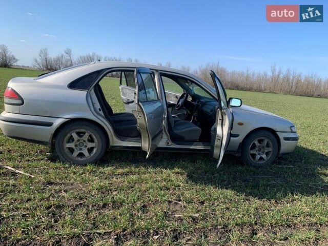 Серый Мазда 626, объемом двигателя 2 л и пробегом 312 тыс. км за 2800 $, фото 7 на Automoto.ua