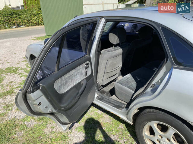 Серый Мазда 626, объемом двигателя 2 л и пробегом 383 тыс. км за 1650 $, фото 11 на Automoto.ua