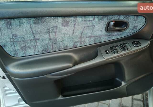 Серый Мазда 626, объемом двигателя 2 л и пробегом 256 тыс. км за 3550 $, фото 4 на Automoto.ua