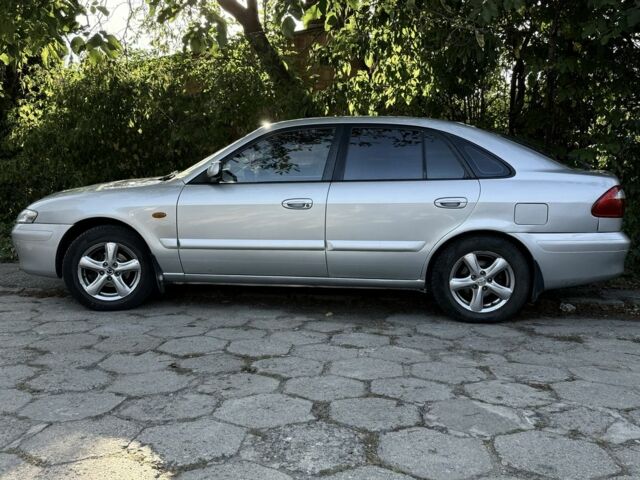 Серый Мазда 626, объемом двигателя 1.8 л и пробегом 299 тыс. км за 2400 $, фото 9 на Automoto.ua