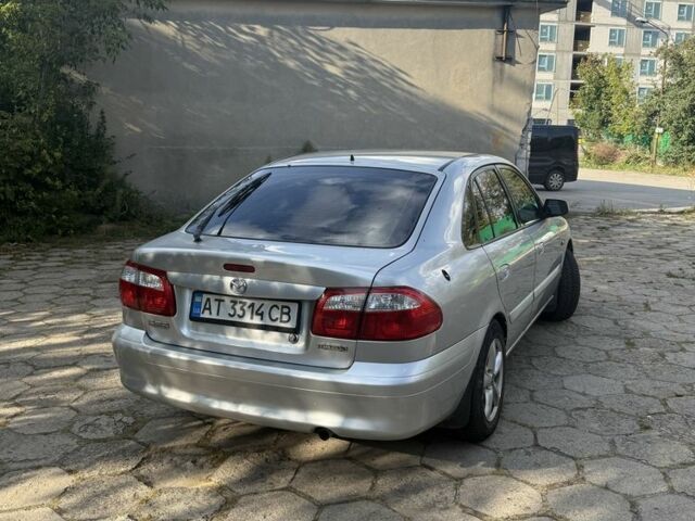 Серый Мазда 626, объемом двигателя 1.8 л и пробегом 299 тыс. км за 2400 $, фото 1 на Automoto.ua