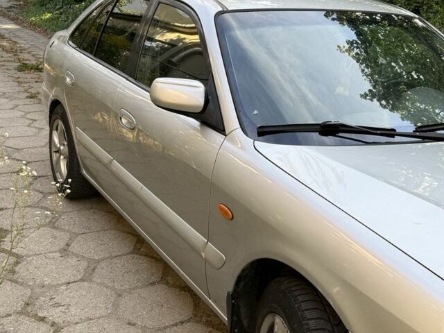 Серый Мазда 626, объемом двигателя 1.8 л и пробегом 299 тыс. км за 2400 $, фото 16 на Automoto.ua