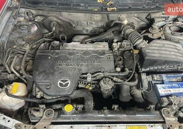 Серый Мазда 626, объемом двигателя 1.99 л и пробегом 367 тыс. км за 800 $, фото 4 на Automoto.ua