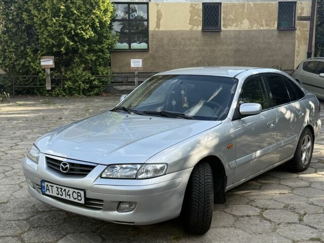 Серый Мазда 626, объемом двигателя 1.8 л и пробегом 299 тыс. км за 2400 $, фото 4 на Automoto.ua