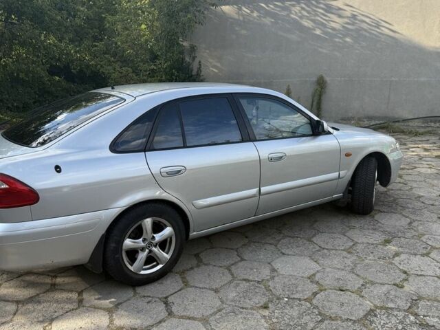 Серый Мазда 626, объемом двигателя 1.8 л и пробегом 299 тыс. км за 2400 $, фото 8 на Automoto.ua