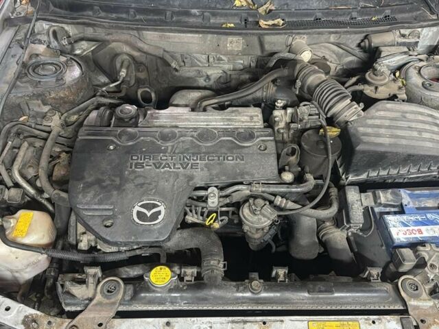 Серый Мазда 626, объемом двигателя 2 л и пробегом 357 тыс. км за 700 $, фото 1 на Automoto.ua