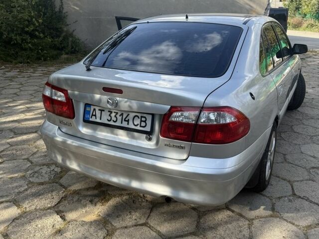 Серый Мазда 626, объемом двигателя 1.8 л и пробегом 299 тыс. км за 2400 $, фото 6 на Automoto.ua