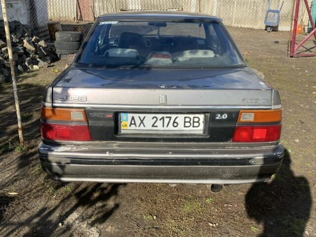 Серый Мазда 626, объемом двигателя 2 л и пробегом 330 тыс. км за 716 $, фото 2 на Automoto.ua