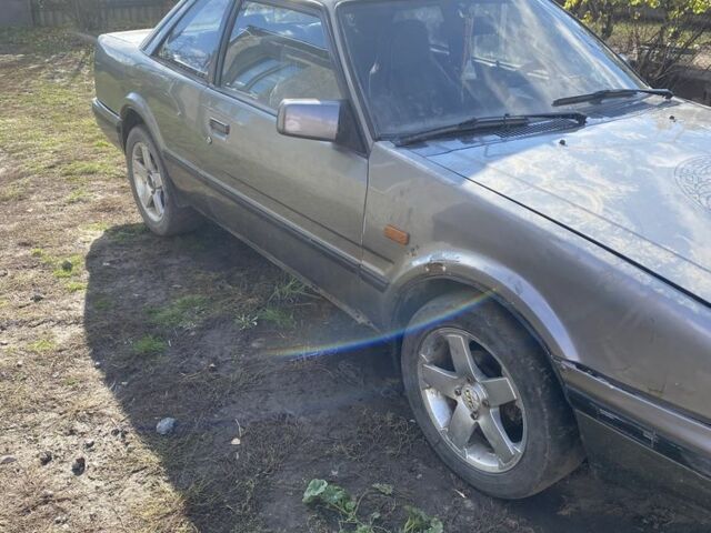 Серый Мазда 626, объемом двигателя 2 л и пробегом 330 тыс. км за 716 $, фото 1 на Automoto.ua