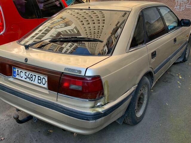 Серый Мазда 626, объемом двигателя 2.2 л и пробегом 430 тыс. км за 705 $, фото 1 на Automoto.ua