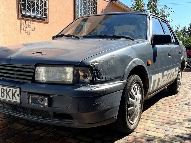 Сірий Мазда 626, об'ємом двигуна 2 л та пробігом 310 тис. км за 700 $, фото 1 на Automoto.ua