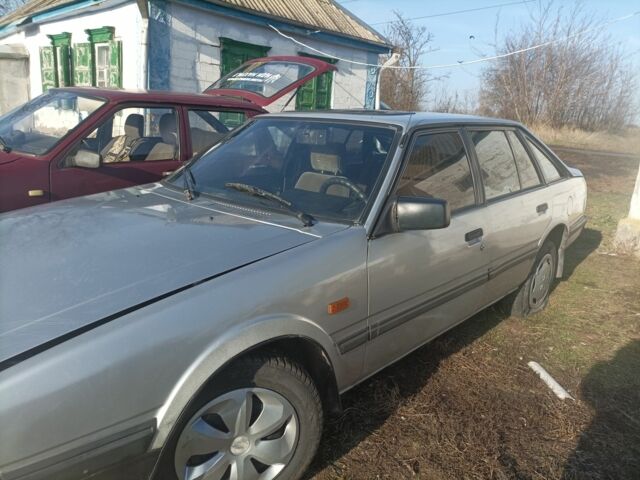 Серый Мазда 626, объемом двигателя 0 л и пробегом 900 тыс. км за 709 $, фото 3 на Automoto.ua