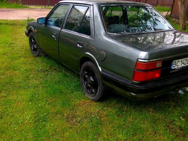 Сірий Мазда 626, об'ємом двигуна 2 л та пробігом 210 тис. км за 1299 $, фото 1 на Automoto.ua