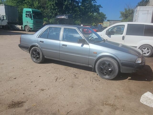 Серый Мазда 626, объемом двигателя 0 л и пробегом 333 тыс. км за 1100 $, фото 1 на Automoto.ua