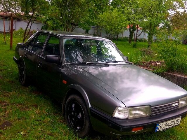 Сірий Мазда 626, об'ємом двигуна 2 л та пробігом 210 тис. км за 1299 $, фото 2 на Automoto.ua