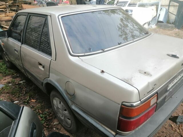 Серый Мазда 626, объемом двигателя 2 л и пробегом 400 тыс. км за 287 $, фото 2 на Automoto.ua