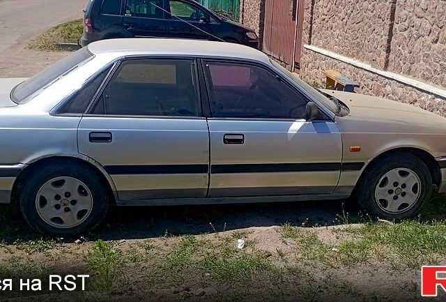 Серый Мазда 626, объемом двигателя 2 л и пробегом 0 тыс. км за 800 $, фото 1 на Automoto.ua