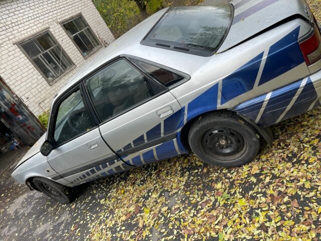 Серый Мазда 626, объемом двигателя 2 л и пробегом 200 тыс. км за 950 $, фото 3 на Automoto.ua