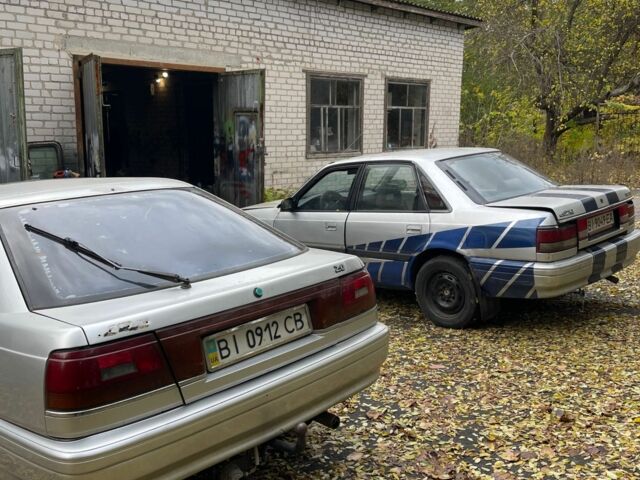 Серый Мазда 626, объемом двигателя 2 л и пробегом 200 тыс. км за 950 $, фото 2 на Automoto.ua