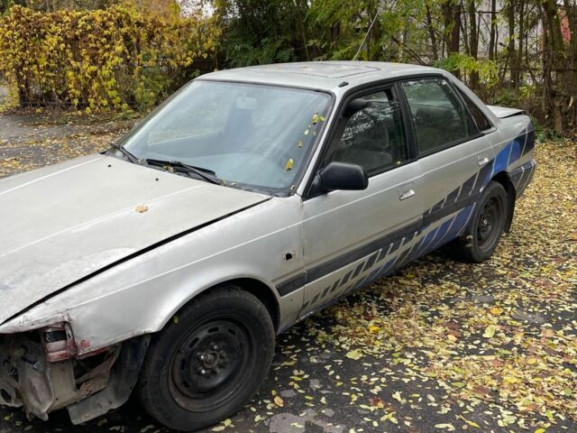 Серый Мазда 626, объемом двигателя 2 л и пробегом 200 тыс. км за 950 $, фото 7 на Automoto.ua