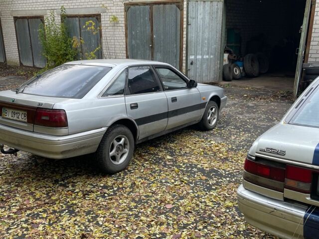 Серый Мазда 626, объемом двигателя 2 л и пробегом 200 тыс. км за 950 $, фото 11 на Automoto.ua