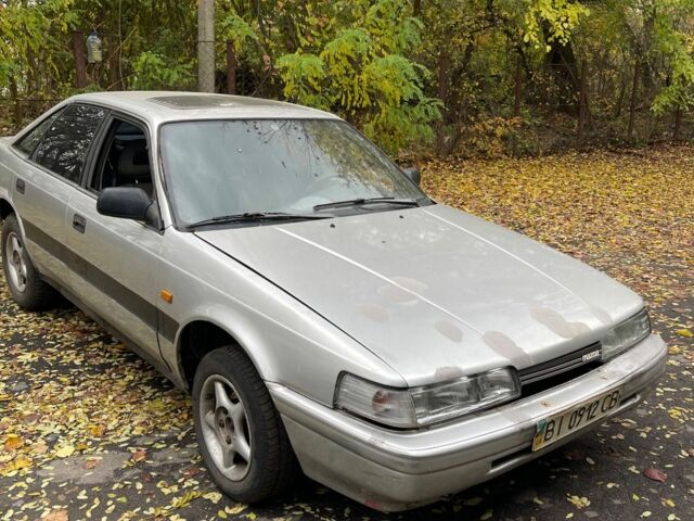 Серый Мазда 626, объемом двигателя 2 л и пробегом 200 тыс. км за 950 $, фото 5 на Automoto.ua