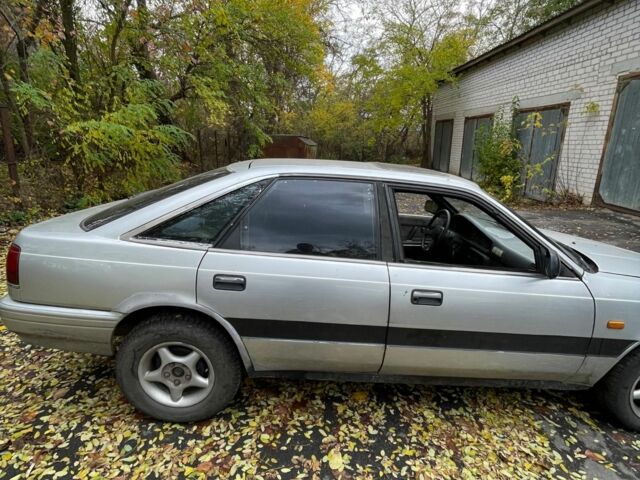 Серый Мазда 626, объемом двигателя 2 л и пробегом 200 тыс. км за 950 $, фото 4 на Automoto.ua