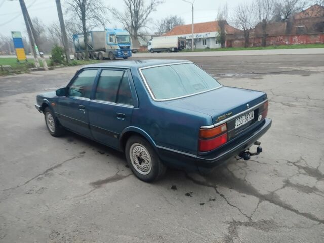 Серый Мазда 626, объемом двигателя 2 л и пробегом 250 тыс. км за 850 $, фото 2 на Automoto.ua