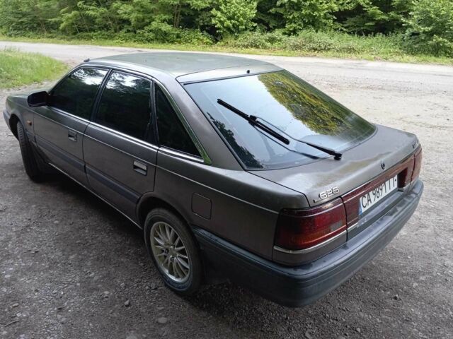 Сірий Мазда 626, об'ємом двигуна 2 л та пробігом 444 тис. км за 1550 $, фото 5 на Automoto.ua