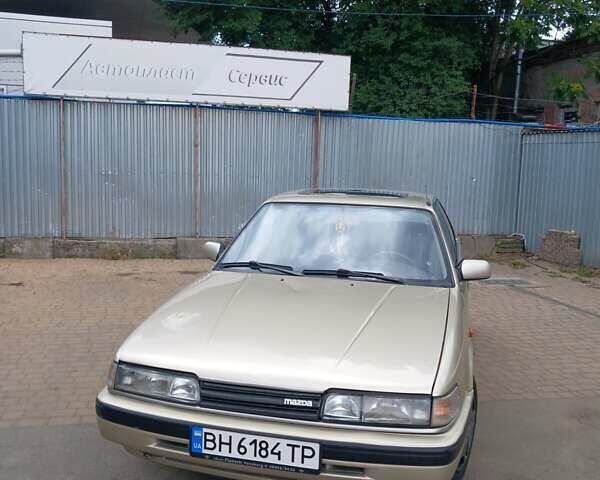 Серый Мазда 626, объемом двигателя 2 л и пробегом 400 тыс. км за 1299 $, фото 3 на Automoto.ua