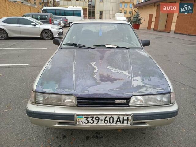 Серый Мазда 626, объемом двигателя 2 л и пробегом 449 тыс. км за 1300 $, фото 5 на Automoto.ua
