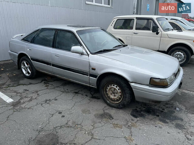 Сірий Мазда 626, об'ємом двигуна 2 л та пробігом 200 тис. км за 450 $, фото 2 на Automoto.ua