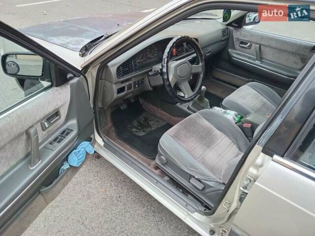 Серый Мазда 626, объемом двигателя 2 л и пробегом 449 тыс. км за 1300 $, фото 7 на Automoto.ua