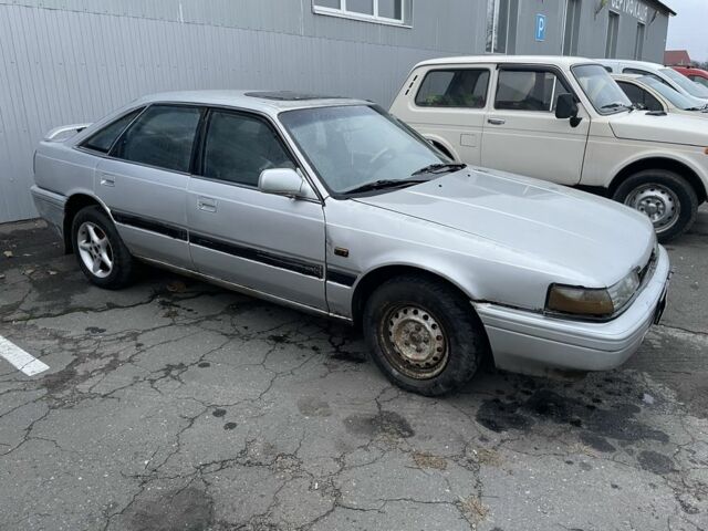 Сірий Мазда 626, об'ємом двигуна 2 л та пробігом 200 тис. км за 450 $, фото 2 на Automoto.ua