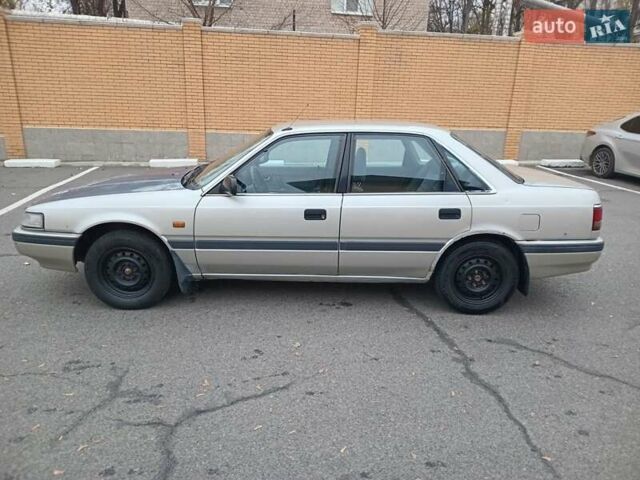 Серый Мазда 626, объемом двигателя 2 л и пробегом 449 тыс. км за 1300 $, фото 3 на Automoto.ua