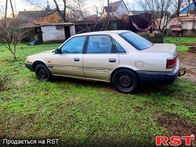 Серый Мазда 626, объемом двигателя 2 л и пробегом 450 тыс. км за 1000 $, фото 3 на Automoto.ua